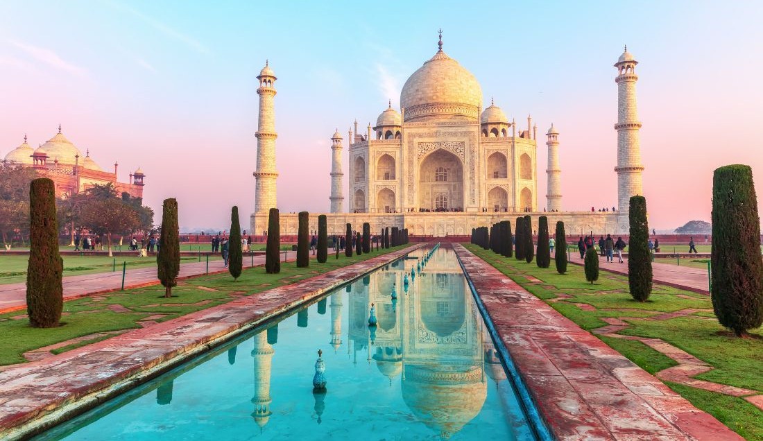 Experience the sunrise or sunset at the Taj Mahal.