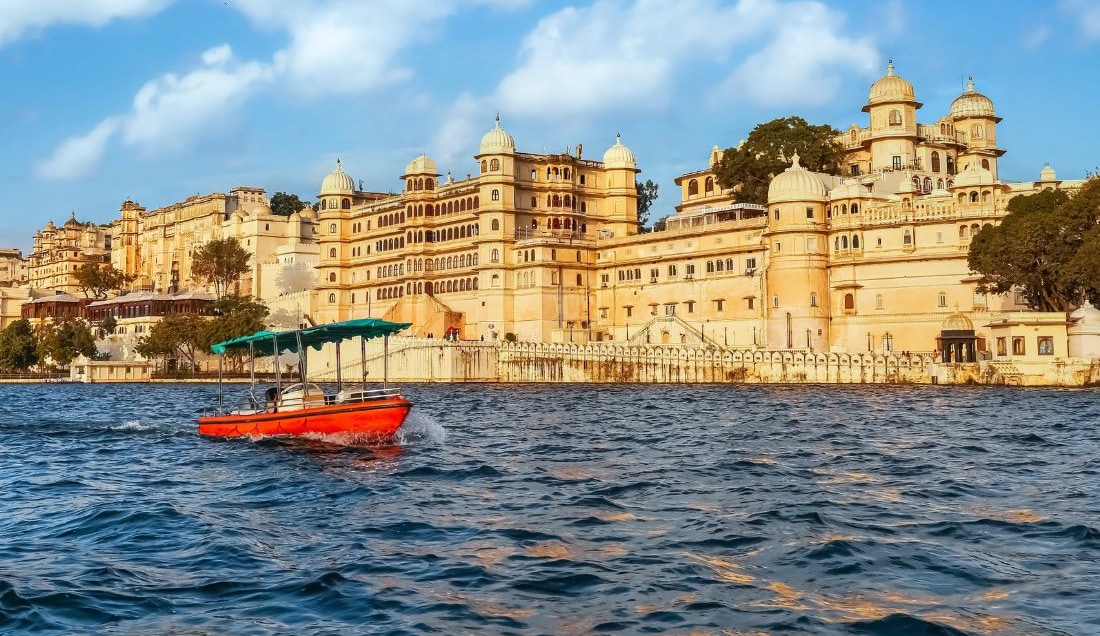 Enjoy a cruise on Lake Pichola for stunning views of Udaipur's City Palace.